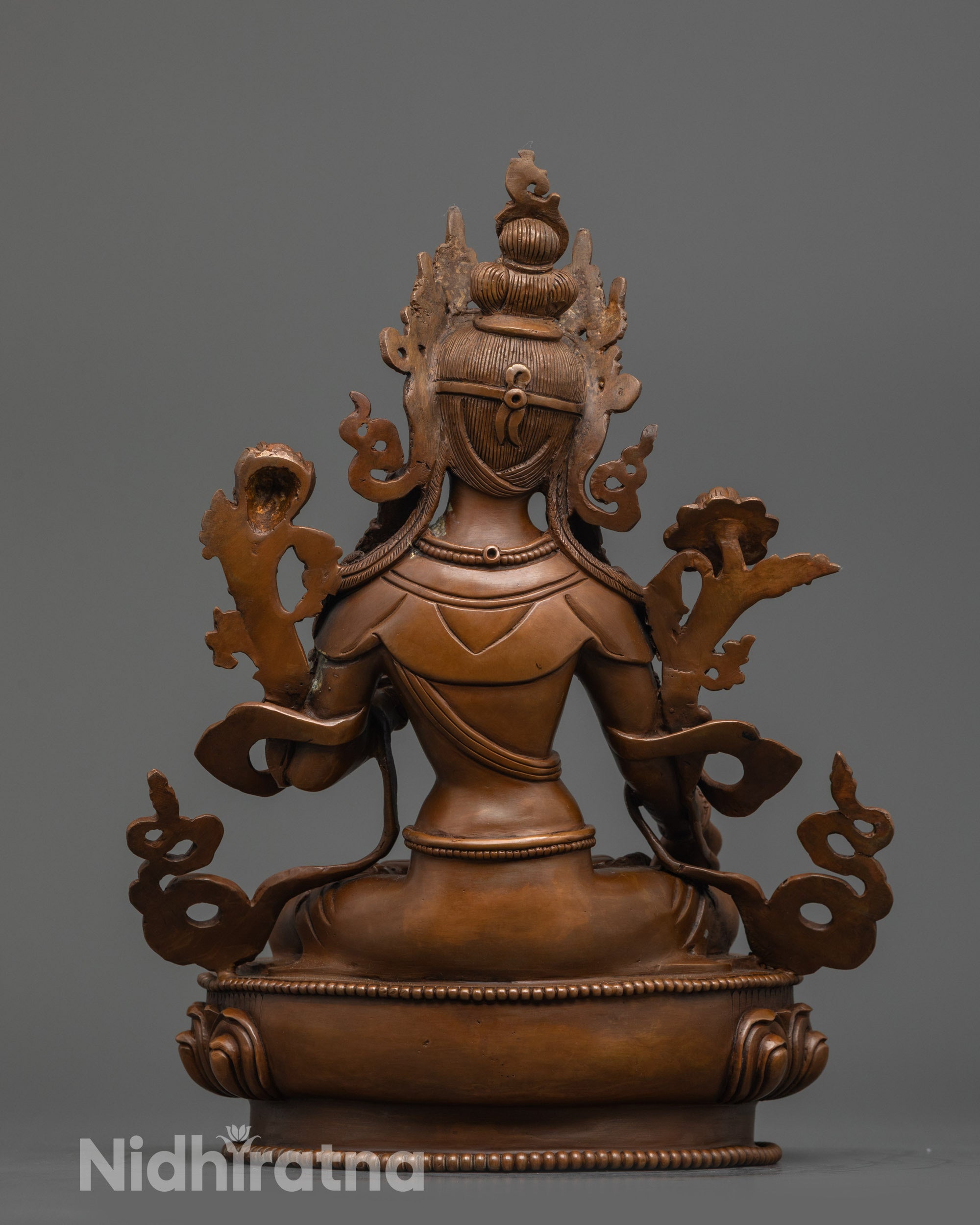 Back view Sita Tara Statue with swirling robe and carved lotus base patterns