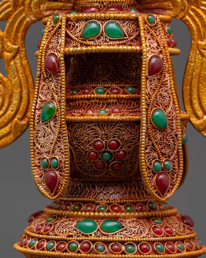 Back view Tibetan Ashtamangala displaying detailed gold-plated knot work and stone patterns