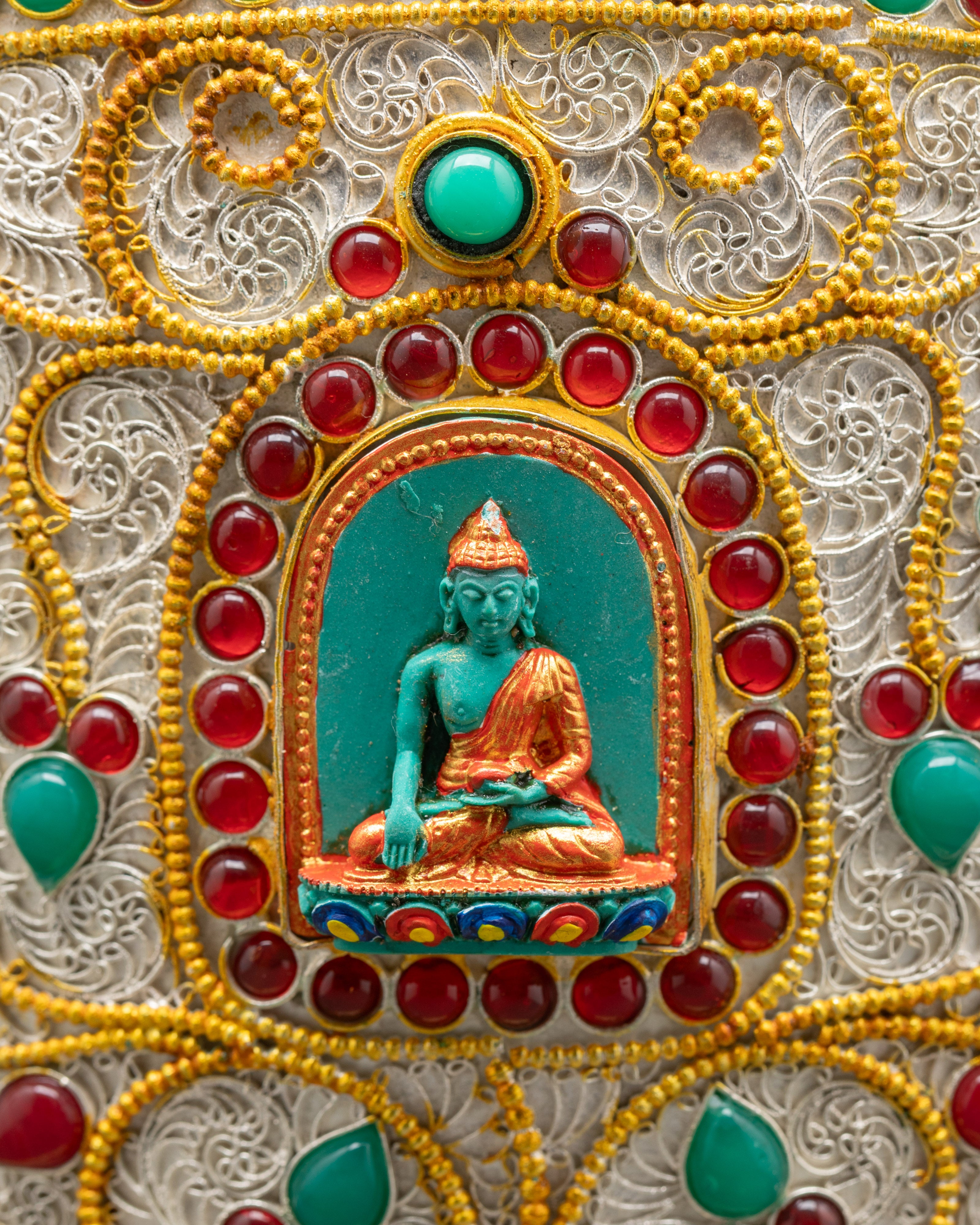 Back view Tibetan rice pot with Shakyamuni Buddha carving and crystal half vajra crown