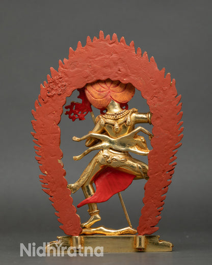 Back view Troma Nagmo sculpture, flowing robes, copper gold-gilded