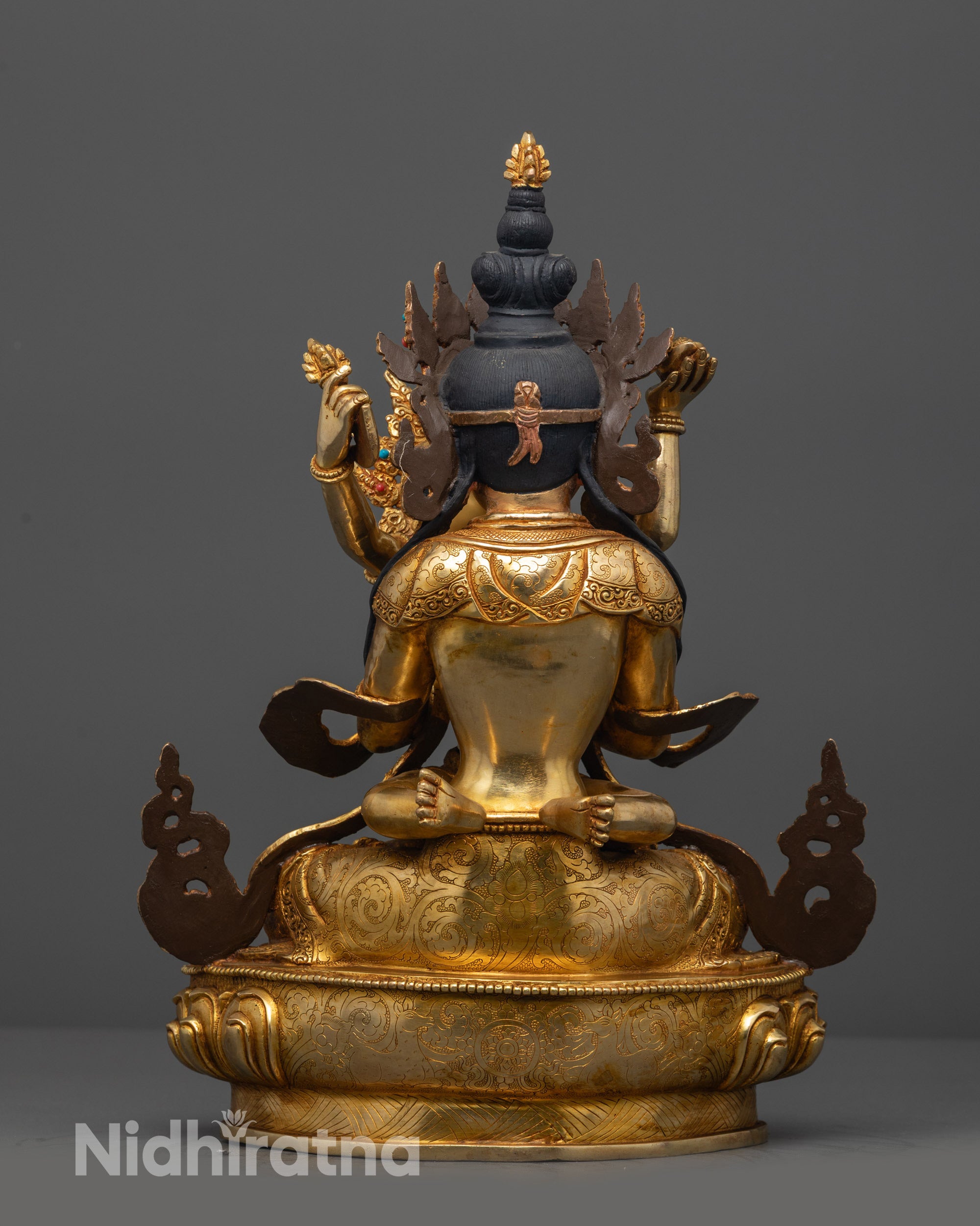 Back view Vajradhara Yab Yum statue highlighting flowing robe and carved lotus seat patterns