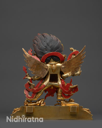 Back view Vajrakilaya sculpture displaying gold-gilded base and detailed tantric motifs