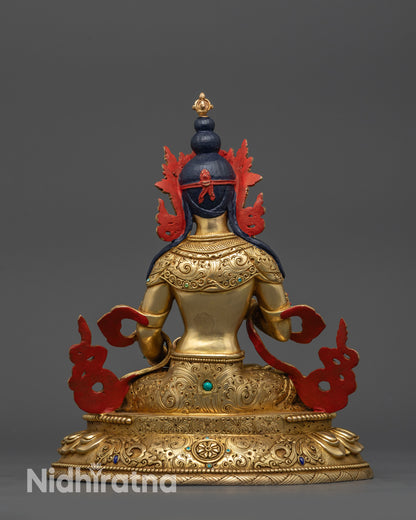 Back view Vajrasattva on lotus seat with intricate carved jewelry and patterns