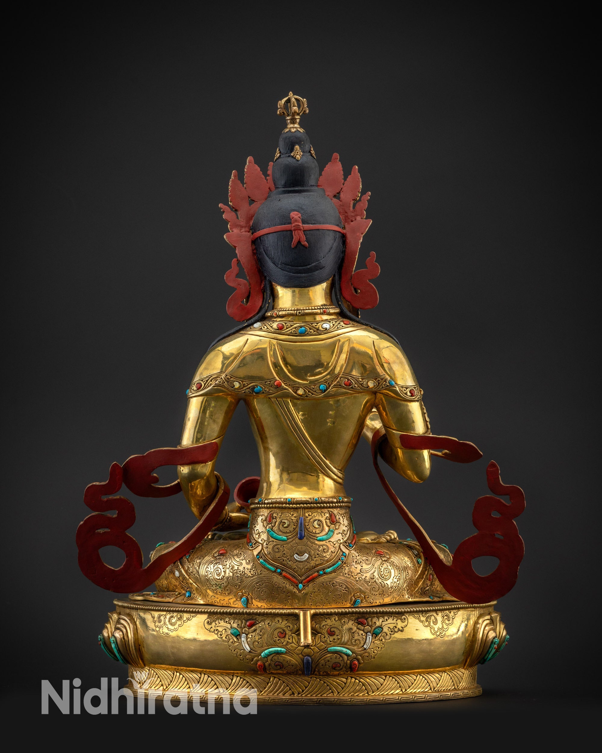 Back view Vajrasattva statue without halo showing detailed robe and filigree