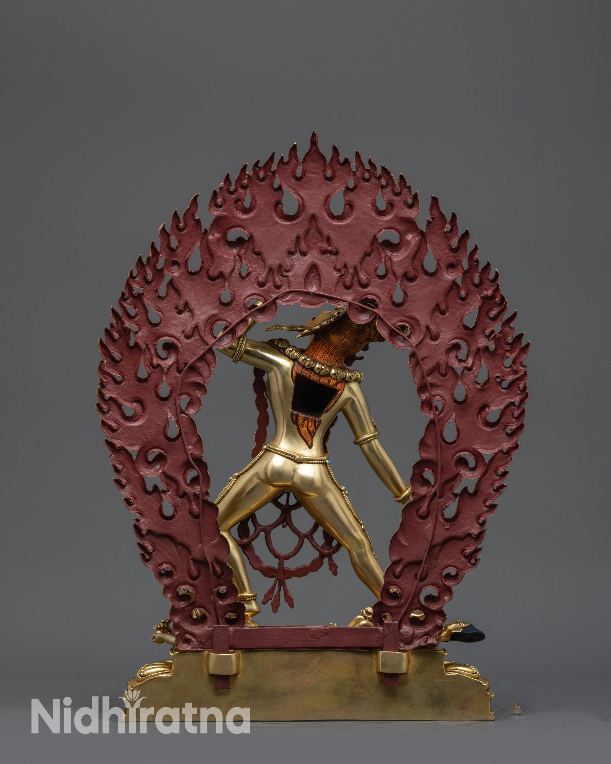 Back view Vajrayogini Statue with fierce halo of flames and intricate patterns
