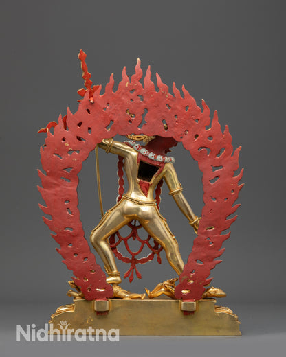 Back view Vajrayogini statue highlighting swirling robes, flames, and carved skull halo