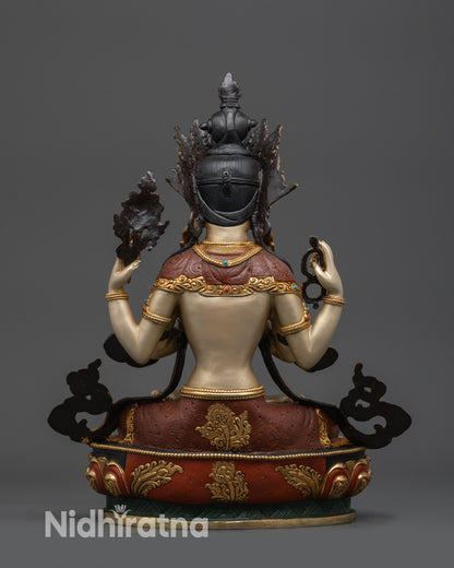Back view White-Hued Chenrezig statue showing gold-plated robe and intricate patterns