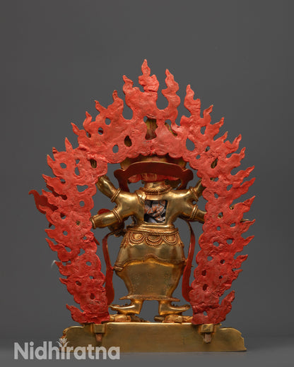 Back view White Mahakala statue featuring lower garments, giant halo, and intricate carving