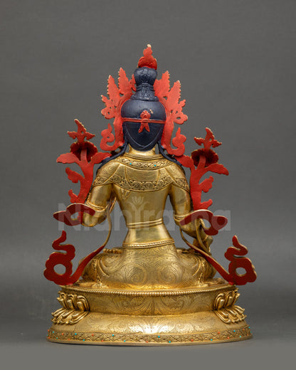 Back view White Tara meditation sculpture showing detailed lotus seat and robe carvings