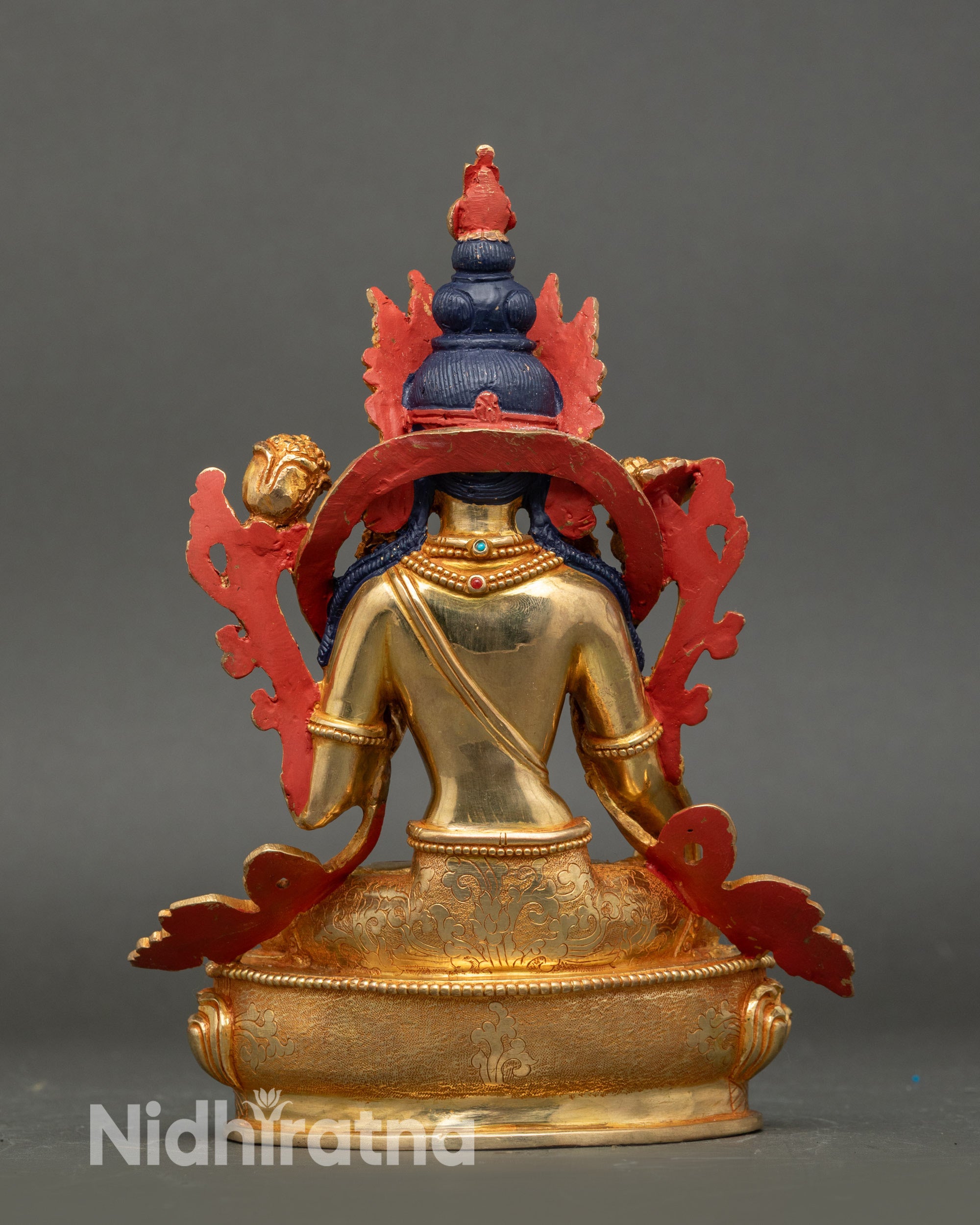 Back view White Tara sculpture with flowing robes, jeweled ornaments, and Nepalese craftsmanship