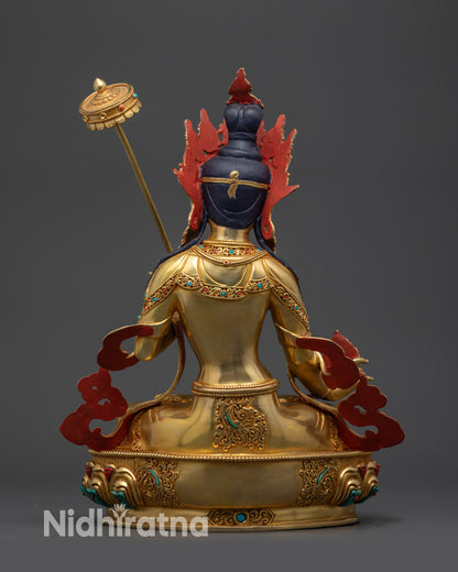 Back view White Umbrella Dukar Statue displaying detailed robe and gold fire-gilded base