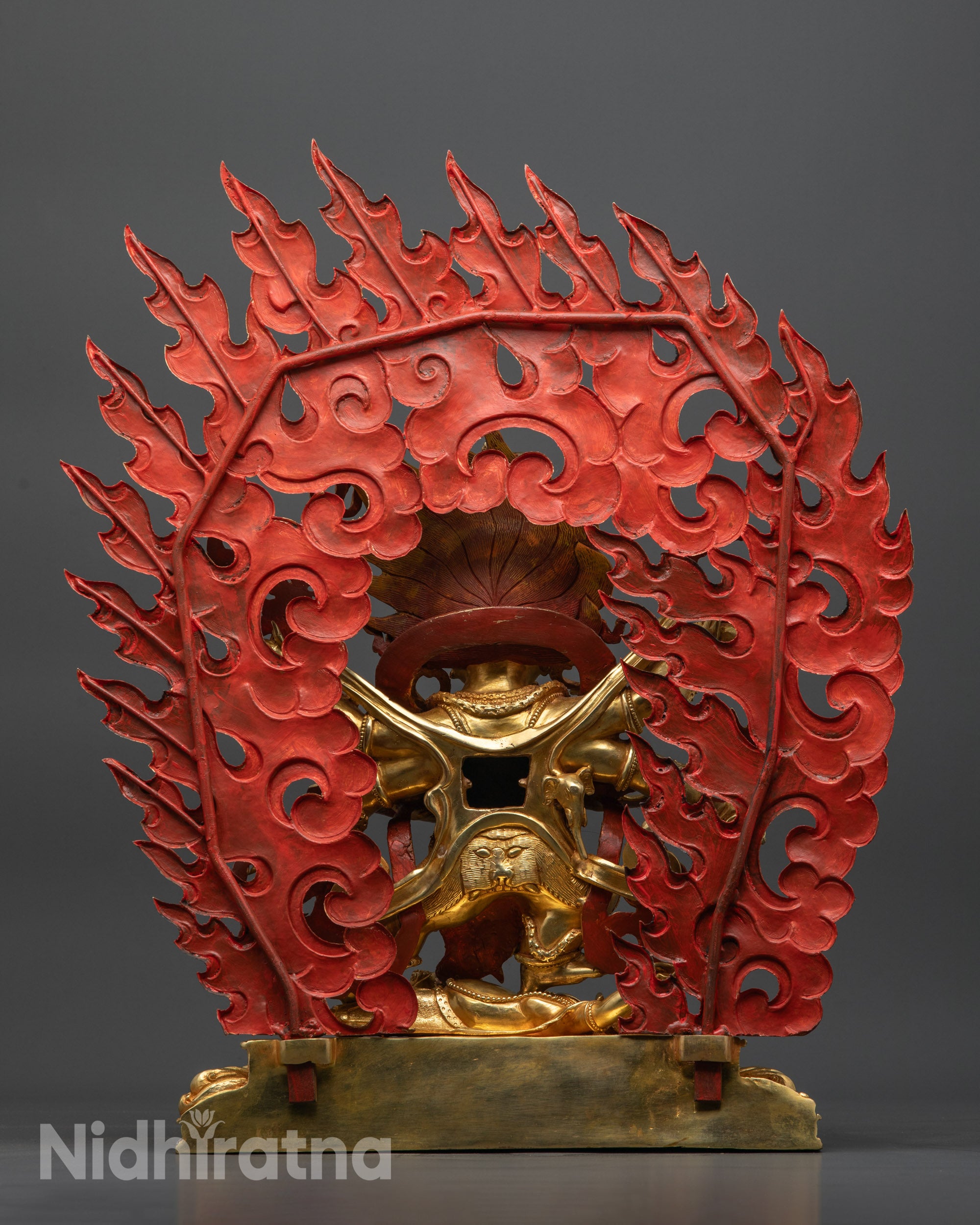 Back view Wrathful Six-Armed Mahakala with detailed lower garments and gold-fire gilding