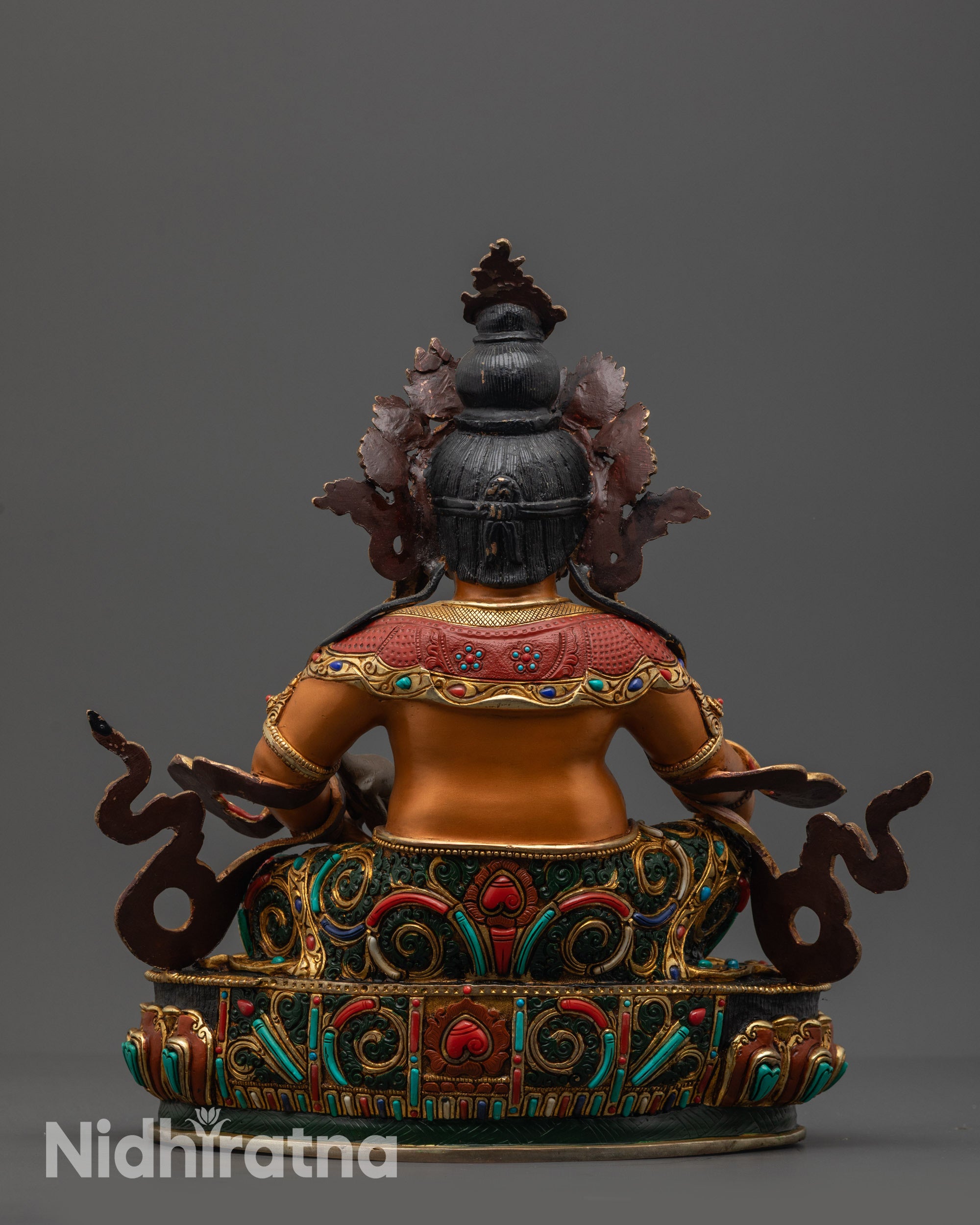 Back view Yellow Dzambhala Statue with lotus seat and colored lower garments