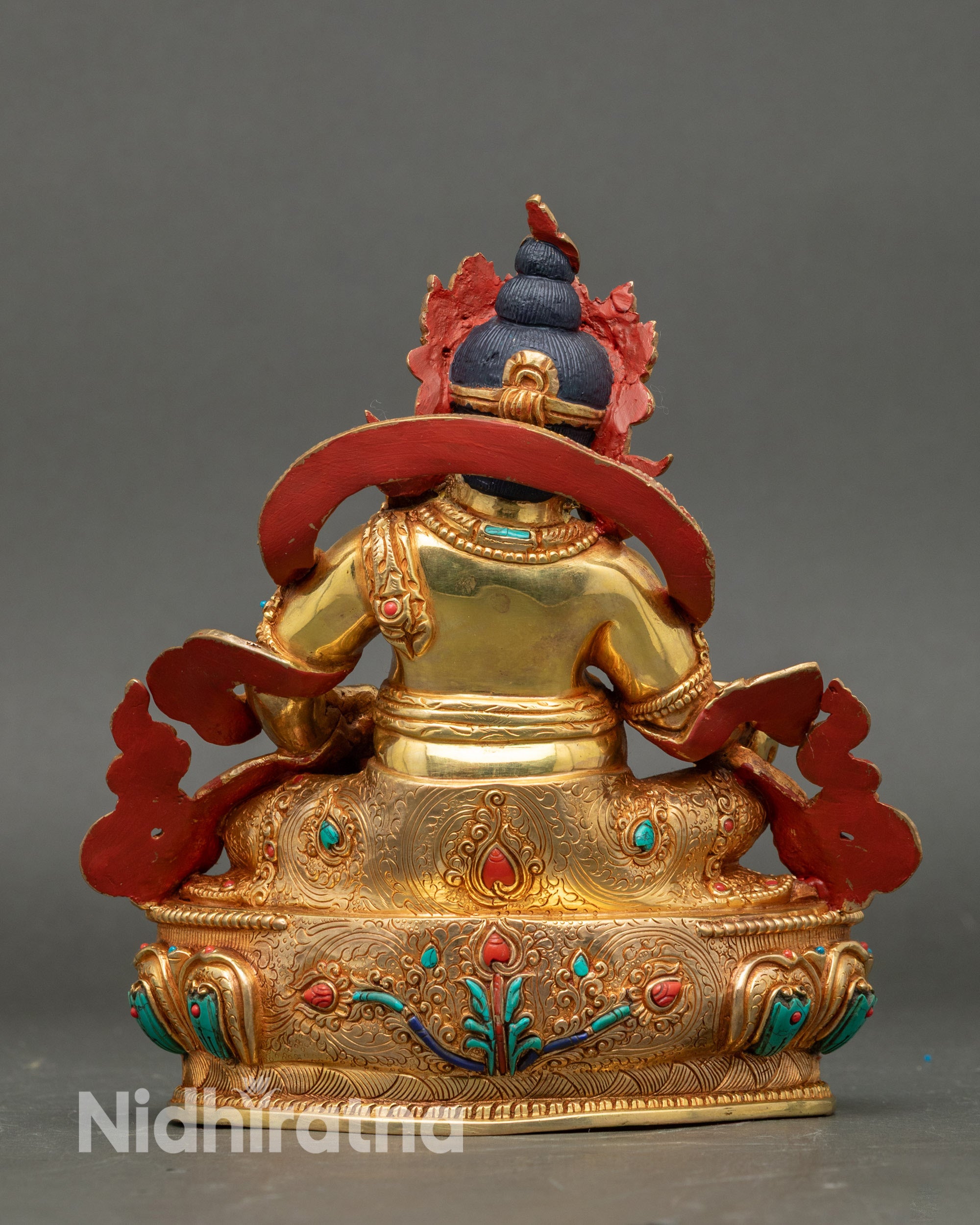 Back view Yellow Dzambhala statue handmade in Patan Nepal gold-gilded Buddhist decor