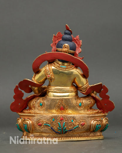 Back view Yellow Dzambhala statue handmade in Patan Nepal gold-gilded Buddhist decor