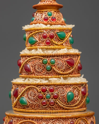 Back view copper Mandala Offering Set showing filigree patterns and tiers