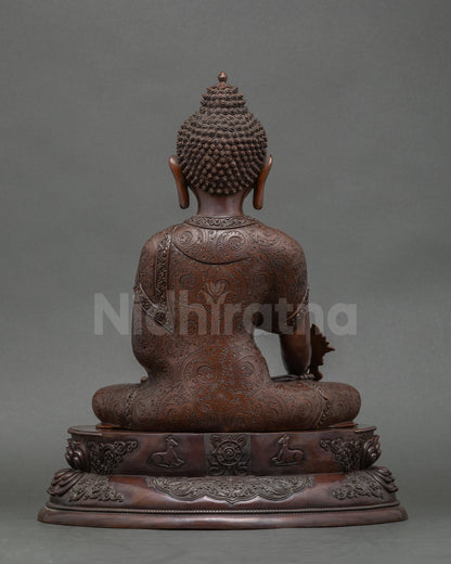 Back view copper Medicine Buddha statue with oxidized details, double lotus throne focus