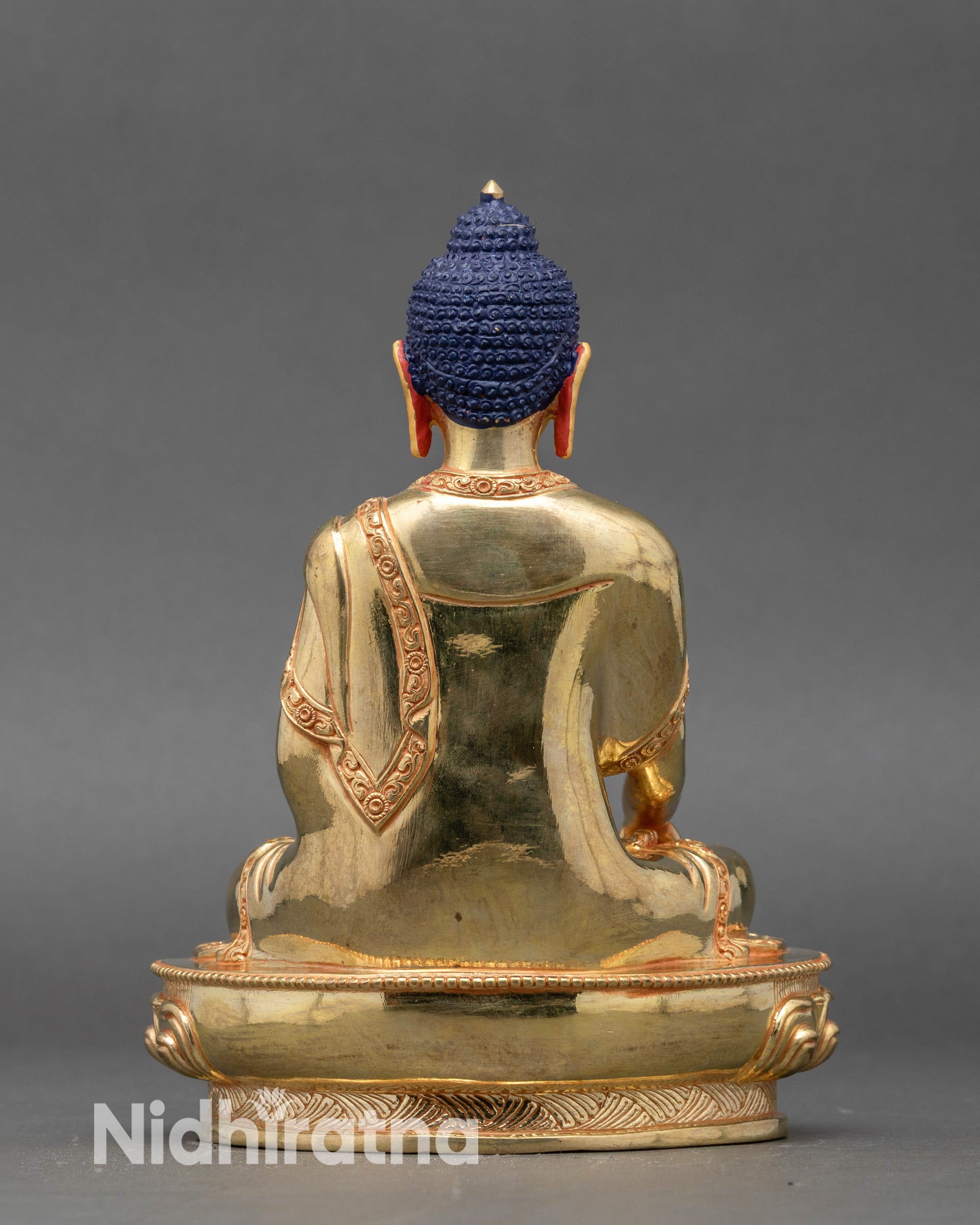Back view gold Shakyamuni Buddha statue Nepal altar meditation art