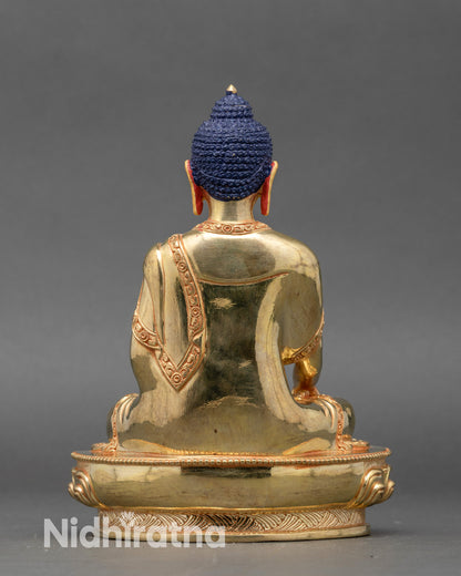 Back view gold Shakyamuni Buddha statue Nepal altar meditation art