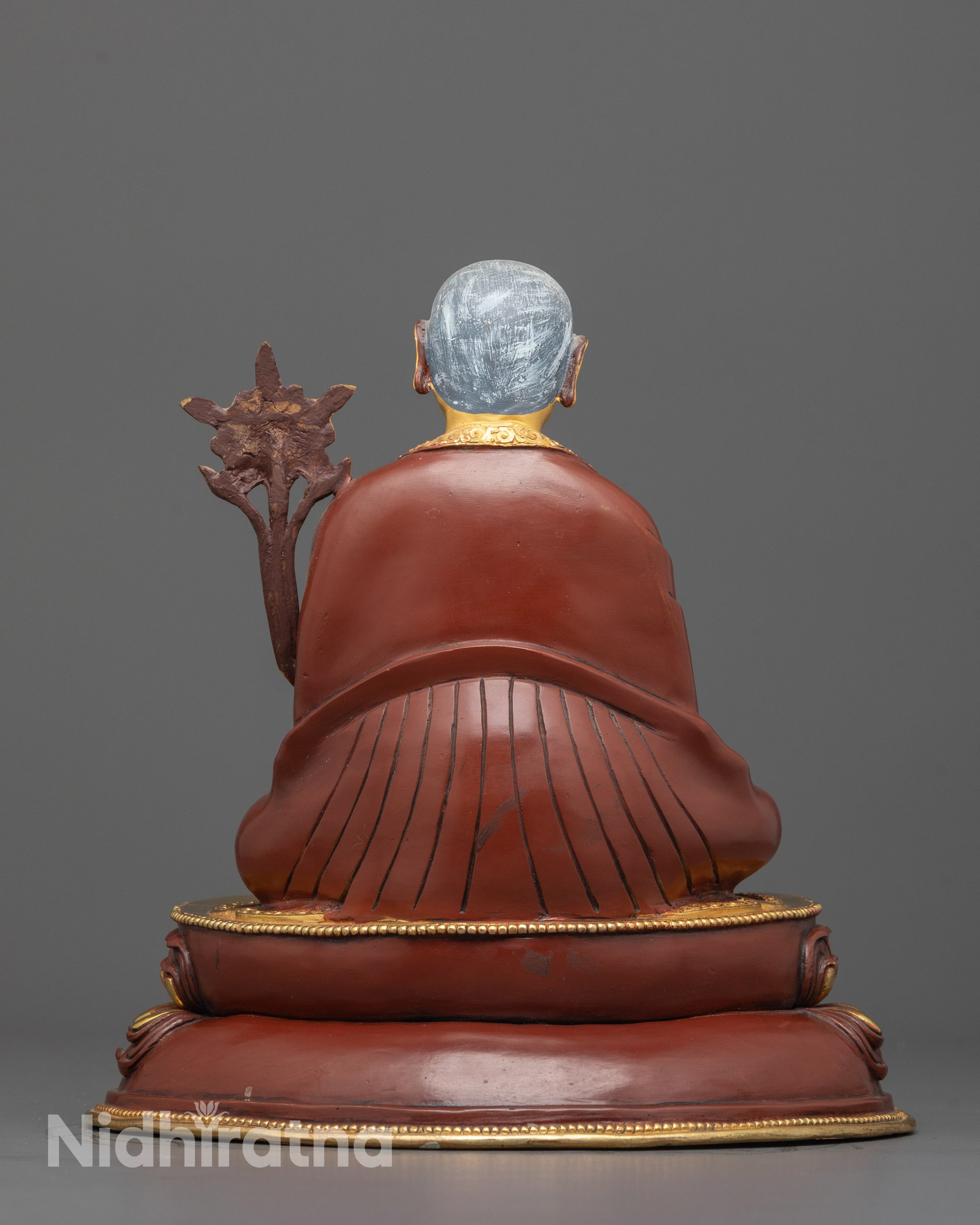 Back view highlighting fire-gilded finish on Sakya Masters handcrafted statues