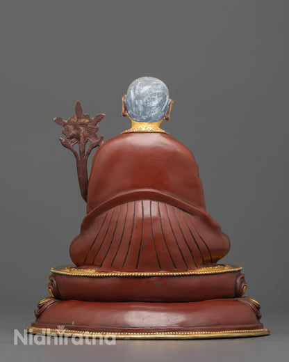 Back view highlighting fire-gilded finish on Sakya Masters handcrafted statues