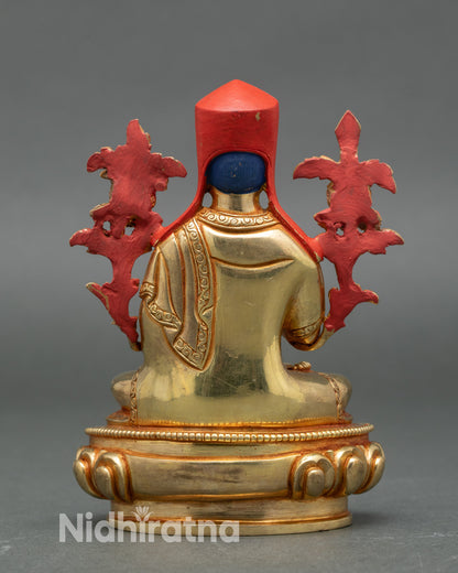 Back view lotus base Sakya Pandita gold gilded Himalayan statue