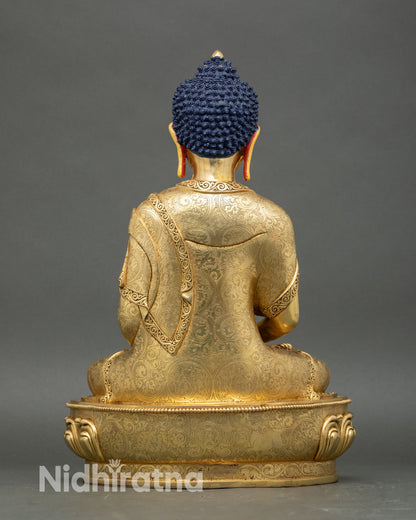 Back view of Amida Nyorai Buddha sculpture with carved lotus pedestal and garment patterns