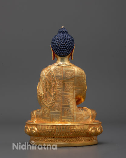 Back view of Amitabha Buddha Statue revealing smooth gold-polished copper surface