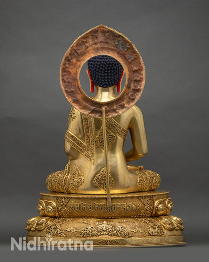 Back view of Amitabha Buddha statue showing halo design and craftsmanship