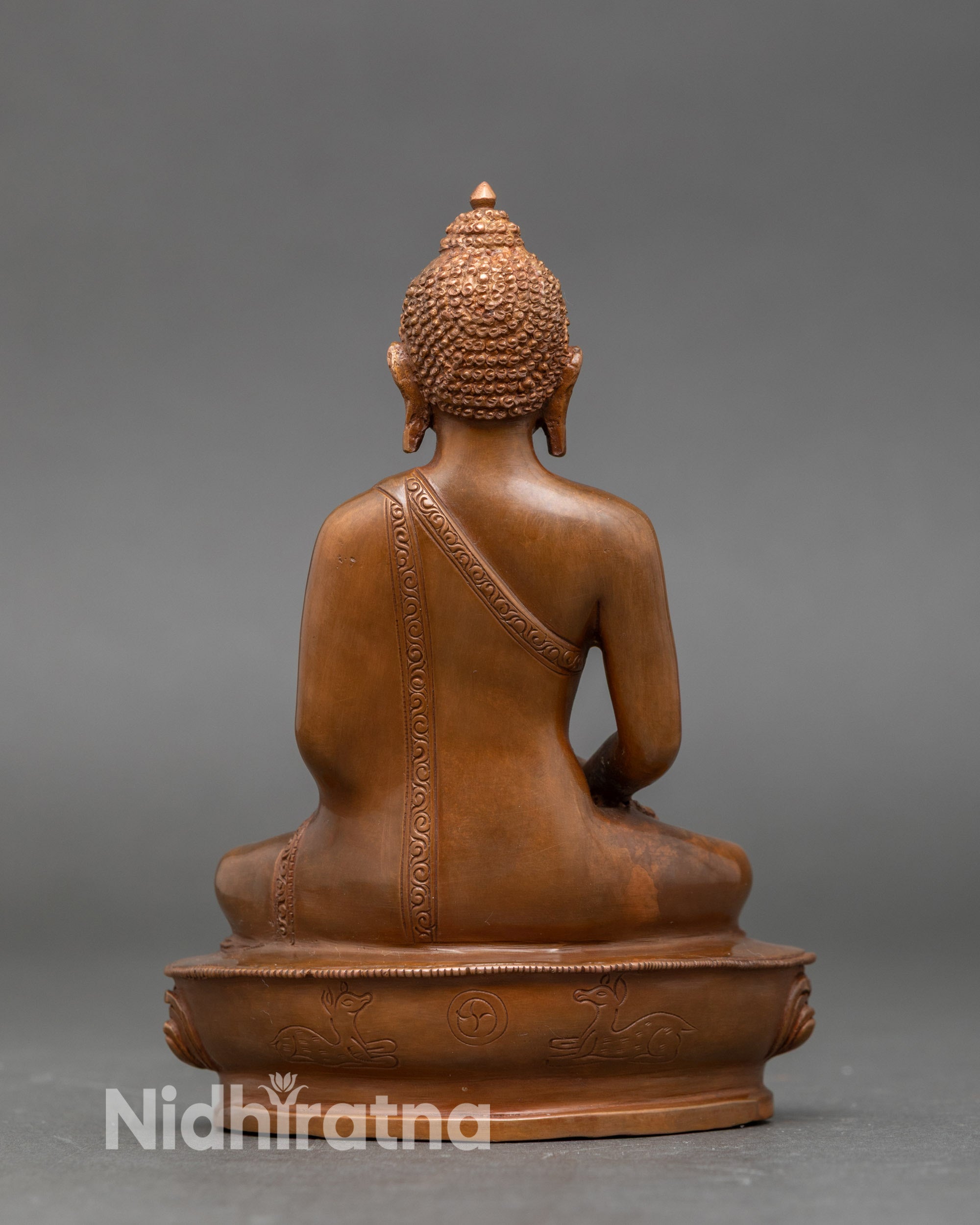 Back view of Amitabha Buddha statue with lotus throne and intricate oxidized finish