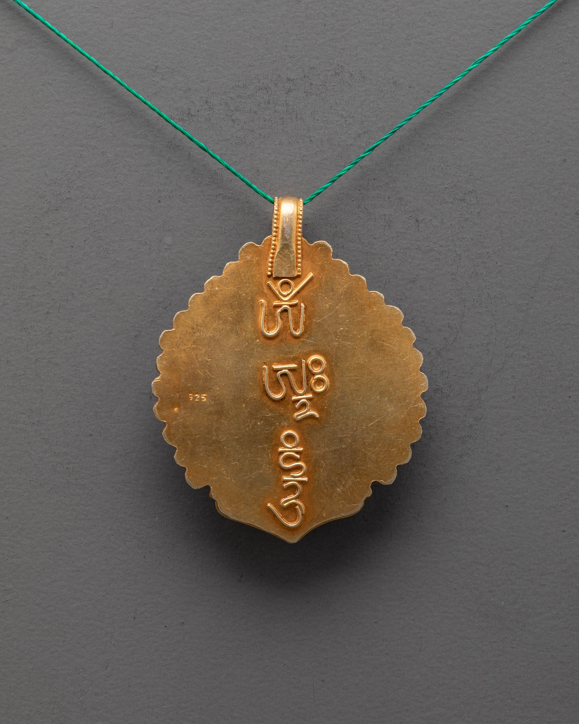 Back view of Authentic Tibetan Coral Manjushri Locket with intricate Nepalese filigree work