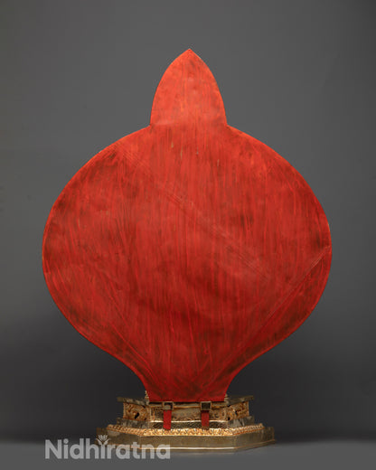 Back view of Avalokiteshvara statue displaying carved arms and lotus seat on moon disc
