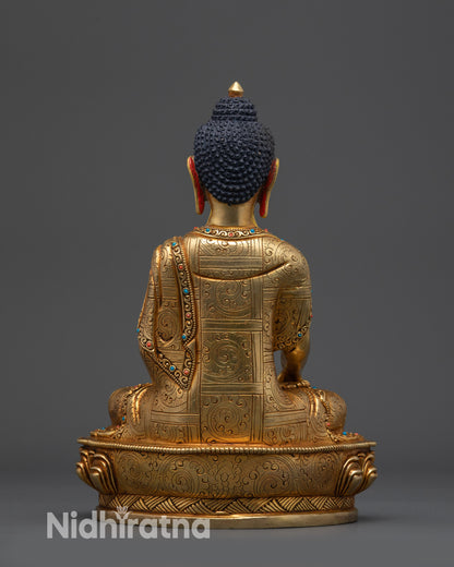 Back view of Bodhi Shakyamuni Buddha showing floral motifs and gold-gilded craftsmanship