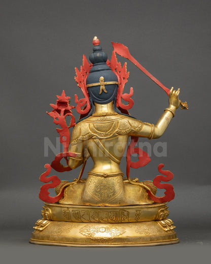 Back view of Bodhisattva Manjushri showing engraved lotus with Manjushri mantra