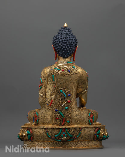 Back view of Buddha Shakyamuni Statue displaying detailed robe patterns and serene posture
