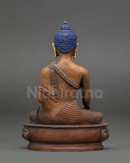 Back view of Buddha Shakyamuni statue showcasing detailed Nepalese craftsmanship