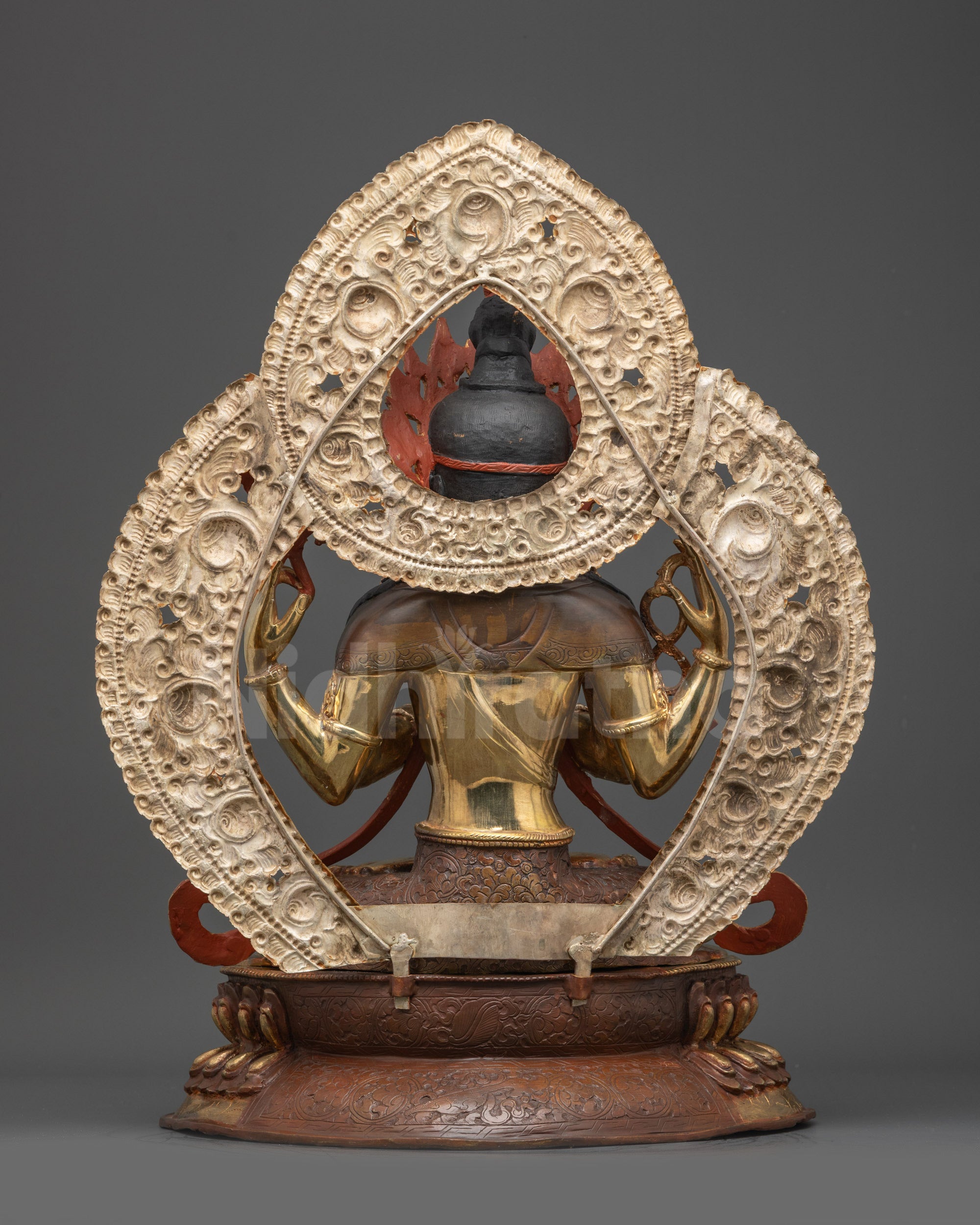Back view of Chenrezig Statue with intricate robes and double-layered lotus seat