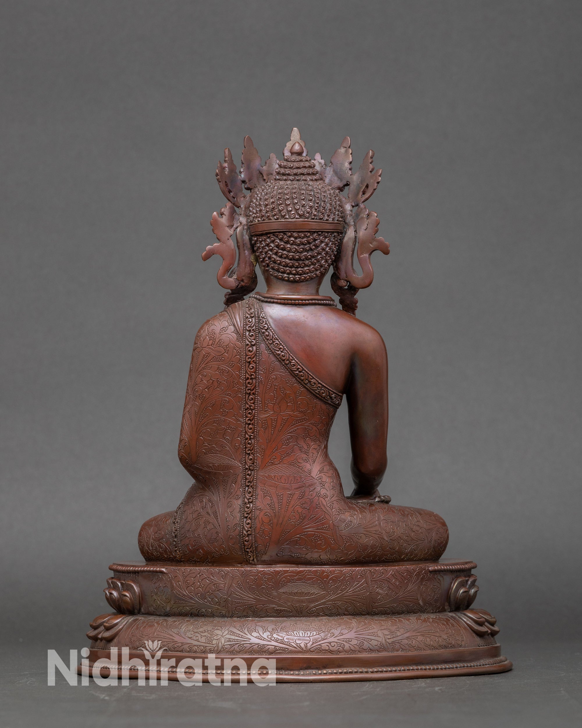 Back view of Crown Shakyamuni Buddha statue with detailed double lotus base and traditional design