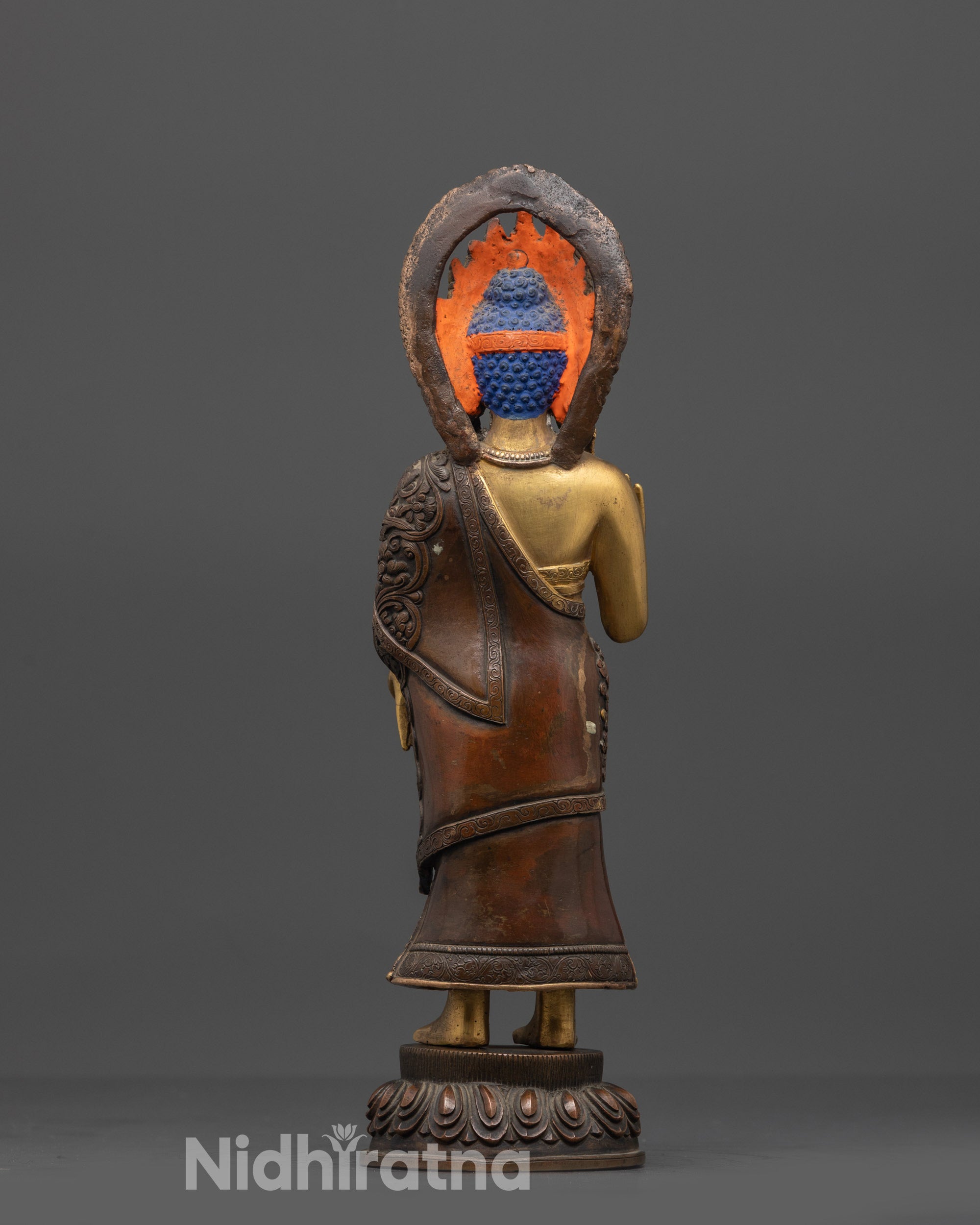 Back view of Dipankara Buddha Statue highlighting gold fire-gilded body and lotus base