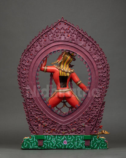Back view of Dorje Naljorma Statue with lotus seat and halo of flames and skulls