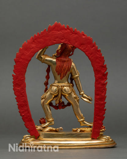 Back view of Dorje Naljorma showing carved halo with flames and skulls