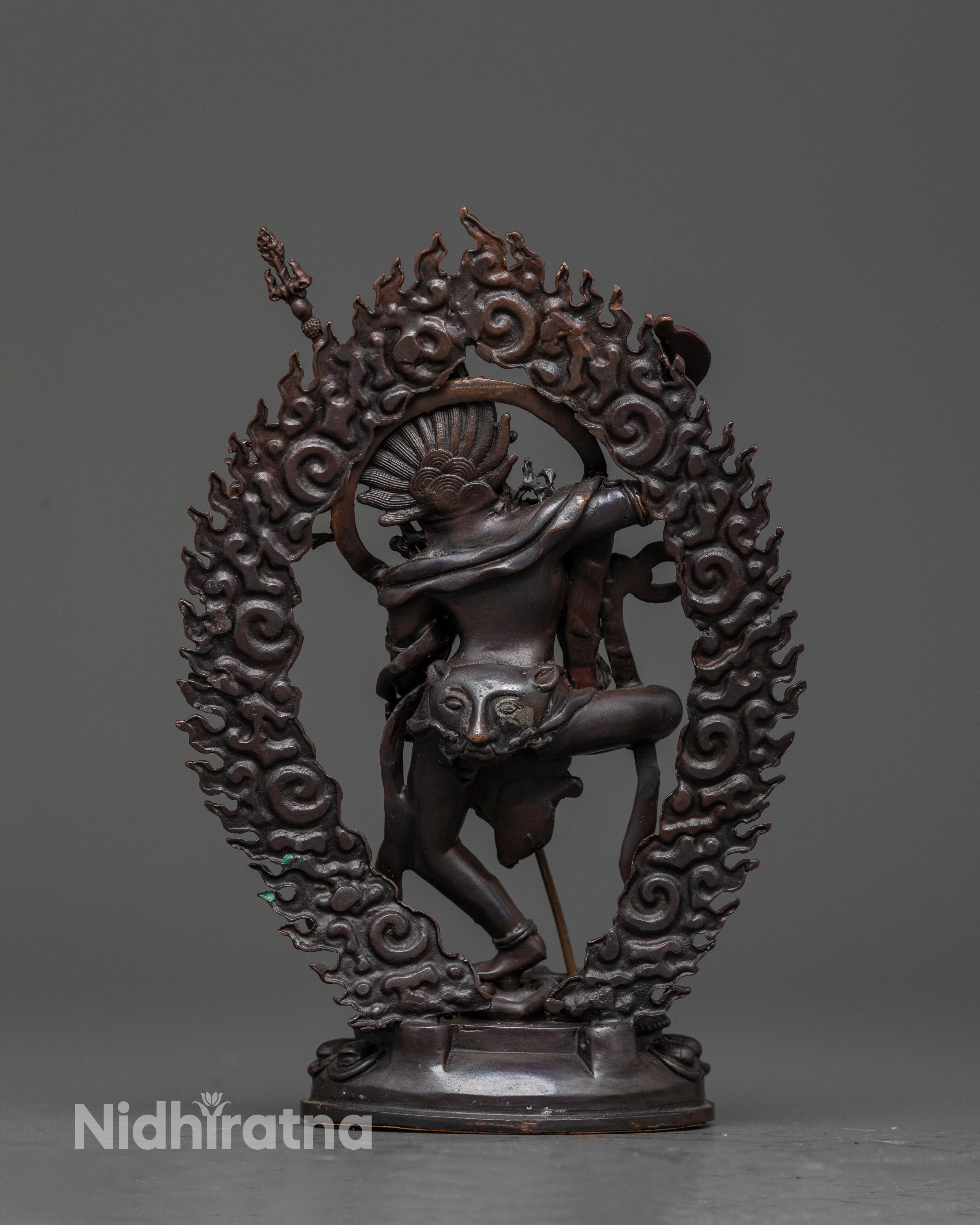 Back view of Dorje Phagmo statue showing flowing robes and intricate detailing