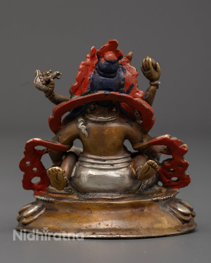Dzambhala Yab-Yum statue displaying ornate carvings, traditional symbols, and masterful lost wax detailing by Nepalese artist.