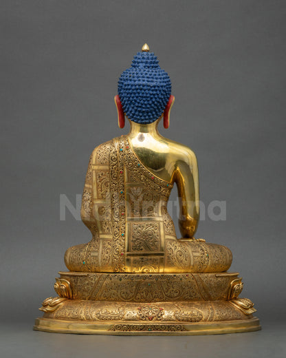 Back view of Enlightened Shakyamuni Buddha Statue highlighting detailed carved robes and patterns
