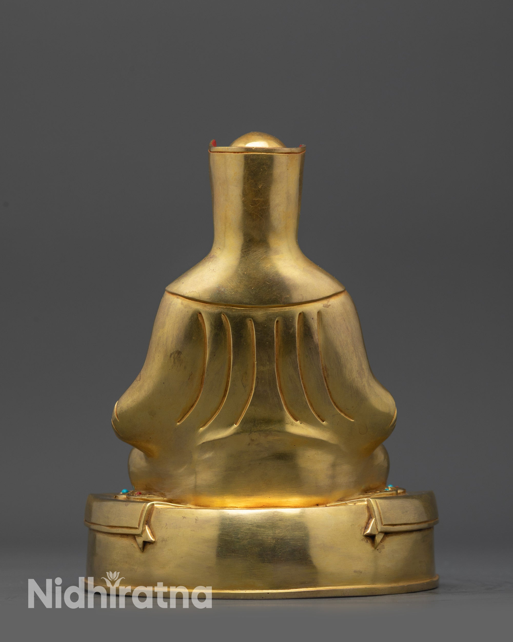 Back view of Gampopa statue 24K gold fire gilded Tibetan Buddhist master sculpture Nepal lost wax crafted.
