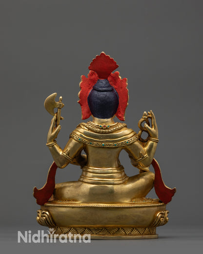 Back view of Ganesha statue with flowing robes and semi-precious stone details