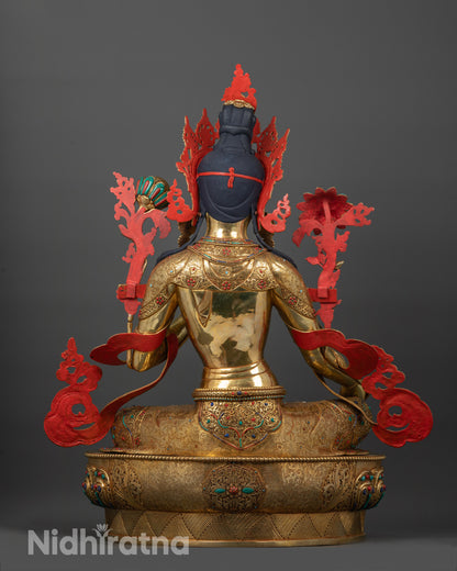 Back view of Green Tara Statue showing gold-plated robe patterns