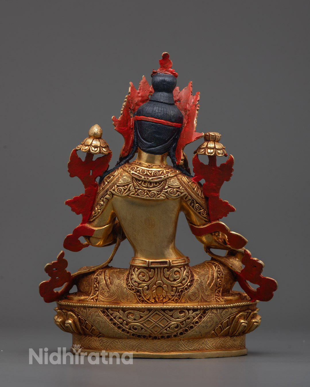 Back view of Green Tara statue highlighting gold-fire gilded body and artisan craftsmanship