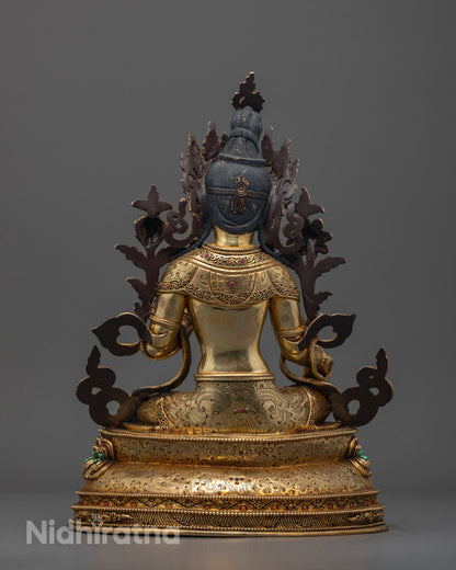Back view of Green Tara statue seated on double lotus throne with vibrant semi-precious stones