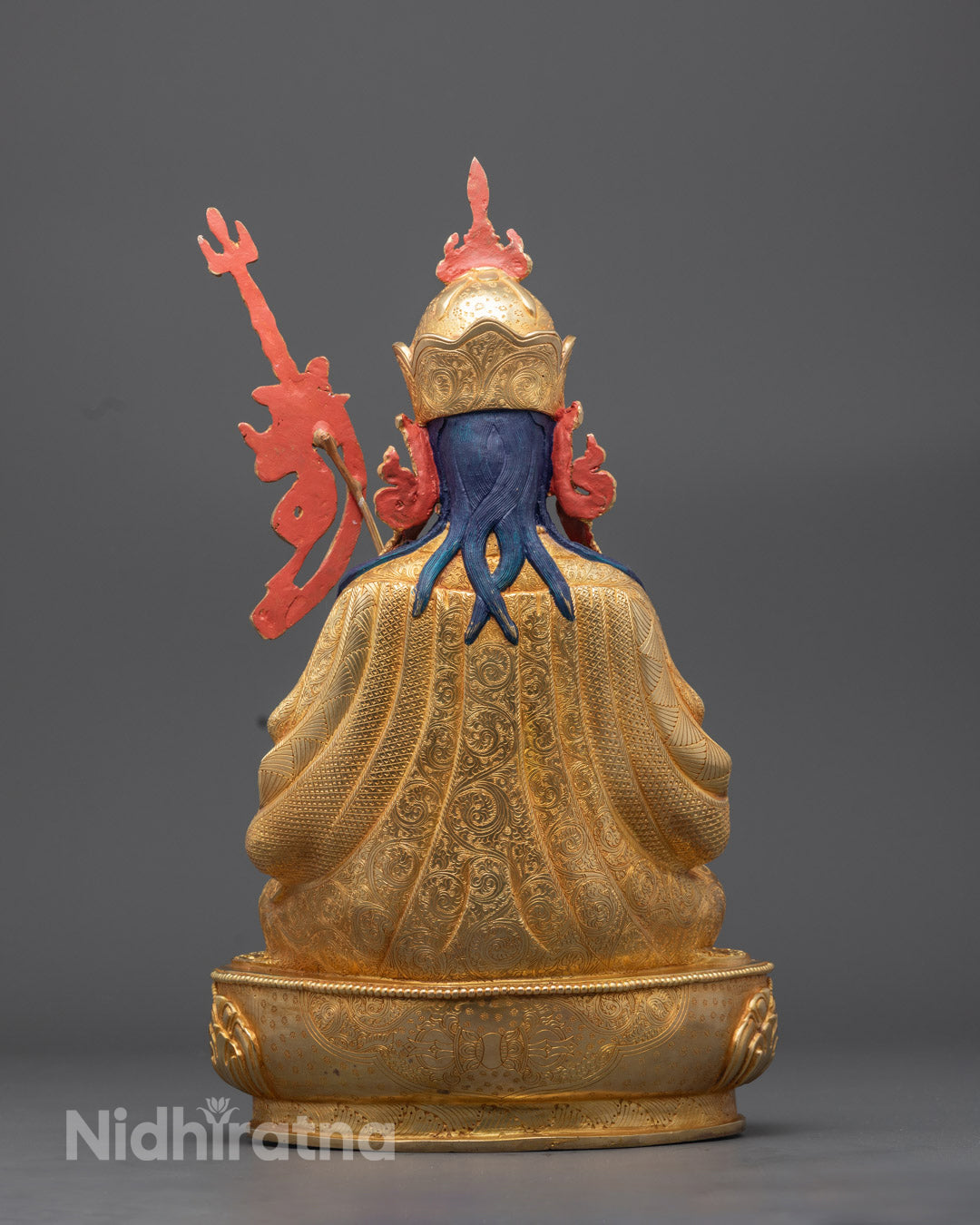 Back view of Guru Padma Vajra Statue highlighting robe details and lotus throne carvings


